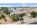 A charming single-story house boasting solar panels, desert landscaping, and a two-car garage at 21104 E Poco Calle --, Queen Creek, AZ 85142