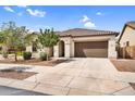 Beautiful single-story home with a two-car garage, desert landscaping and a tile roof at 21104 E Poco Calle --, Queen Creek, AZ 85142