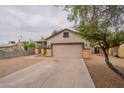 Charming single-Gathering home featuring a two-car garage and covered porch at 2210 N 27Th Pl, Phoenix, AZ 85008