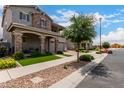 A peaceful street view of attractive homes featuring tidy lawns and trees at 2605 S Quaintance St, Gilbert, AZ 85295