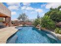 Sparkling backyard pool with desert landscaping and seating area with mountain views at 27892 N 108Th Way, Scottsdale, AZ 85262