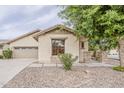 Close up of a single-story home featuring desert landscaping, and a neutral color scheme at 4067 S White Dr, Chandler, AZ 85249