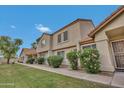 Inviting townhome with well-maintained landscaping and walkway, set in a charming community at 5808 E Brown Rd # 49, Mesa, AZ 85205