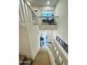 Bright and airy entryway featuring a staircase, neutral color palette and flooded with natural light at 727 W Maryland Ave # 1, Phoenix, AZ 85013