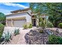 Beautiful home with front yard that features low maintenance desert landscaping at 7342 E Norwood St, Mesa, AZ 85207