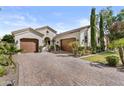 Attractive single-story home with a three car garage and paver driveway at 211 W New Dawn Dr, Chandler, AZ 85248