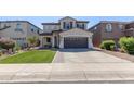 Beautiful two-story home with a well-kept lawn and inviting curb appeal at 4771 E Meadow Land Dr, San Tan Valley, AZ 85140