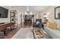 Open-concept living room and dining area with comfortable seating and stylish decor at 7777 E Main St # 143, Scottsdale, AZ 85251