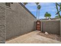 Side yard area of this home with small privacy fence and desert landscaping at 2338 W Lindner Ave # 52, Mesa, AZ 85202