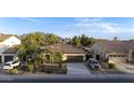 Beautiful single-Gathering home showing desert landscaping and a two car garage at 2991 E Fandango Dr, Gilbert, AZ 85298