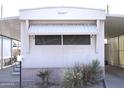 Charming home exterior featuring a well-maintained facade and manicured landscaping at 345 S 58Th St # 10, Mesa, AZ 85206