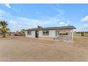 Beautifully remodeled single-story home with covered parking, modern windows, and clean white exterior at 546 N 96Th Pl, Mesa, AZ 85207