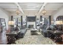 Bright living room with beamed ceilings, skylights, and stylish furnishings at 6333 N Scottsdale Rd # 5, Scottsdale, AZ 85250