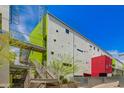 Unique exterior view featuring striking architectural elements, colorful accents, and a modern staircase at 1111 W University Dr # 3016, Tempe, AZ 85281