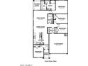 First floor plan featuring four bedrooms, open concept kitchen, and a covered patio at 1337 W Hess Ave, Coolidge, AZ 85128