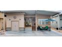 Charming home with a covered porch and well-maintained exterior at 17200 W Bell Rd # 1015, Surprise, AZ 85374