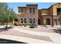 Charming two-story home with desert landscaping and a stone facade at 20750 N 87Th St # 2062, Scottsdale, AZ 85255