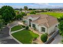 Expansive home with lush landscaping, a circular driveway, and ample parking space in a desirable neighborhood at 2625 N 24Th St # 22, Mesa, AZ 85213