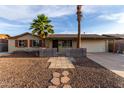 Inviting single-Gathering home with desert landscaping and stone pathway to front door at 3643 E Friess Dr, Phoenix, AZ 85032