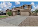 Charming two-story home features a spacious driveway and well-maintained landscaping at 4647 E County Down Dr, Chandler, AZ 85249