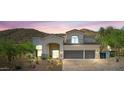 Charming two story home featuring a tile roof, stucco walls, and large two car garage at 11446 E Sweetwater Ave, Scottsdale, AZ 85259