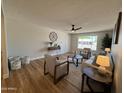 Bright living room with ample natural light, stylish decor, and comfortable seating, perfect for relaxation and entertainment at 2337 E Manhatton Dr, Tempe, AZ 85282