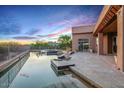 Inviting backyard pool area with beautiful sunset views at 40858 N 109Th Pl, Scottsdale, AZ 85262