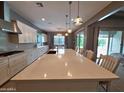 Spacious kitchen island perfect for meal prep and casual dining with generous countertops at 9187 W Parkside Ln, Peoria, AZ 85383