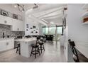 Spacious living area featuring modern open concept layout, countertops, seating and city views at 1 E Lexington Ave # 1108, Phoenix, AZ 85012