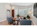 Bright living room featuring modern furnishings, lots of natural light, and a cozy seating area at 1057 W Laurel Ave, Gilbert, AZ 85233