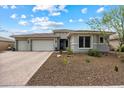 Charming single-story home with a three-car garage and low-maintenance desert landscaping at 16226 S 35Th Dr, Phoenix, AZ 85045