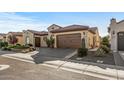 Charming single-story home featuring desert landscaping with a clay tile roof and an attached two-car garage at 25971 W Taro Dr, Buckeye, AZ 85396
