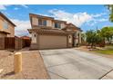 Charming two-story home with a two-car garage, a side fence, and low-maintenance landscaping at 6637 W Watkins St, Phoenix, AZ 85043