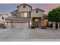 Charming two-story home boasting a three-car garage and inviting curb appeal at 6971 W El Cortez Pl, Peoria, AZ 85383
