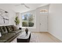 Cozy living room with a large window providing natural light and a view of the outdoors at 732 W Sagebrush St, Gilbert, AZ 85233