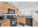 Functional kitchen with appliances, providing an efficient cooking space at 16887 W Belleview St, Goodyear, AZ 85338