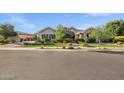 Attractive home with a well-maintained lawn and charming curb appeal at 2094 E Aris Dr, Gilbert, AZ 85298