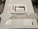 Selection of tile, flooring and cabinet samples with modern finishes and textures at 2508 E Preston St, Mesa, AZ 85213