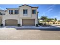 Inviting home with two-car garage, meticulously landscaped front yard, and charming architectural details at 2754 S Apache Dr, Chandler, AZ 85286