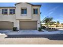 Inviting home with two-car garage, meticulously landscaped front yard, and charming architectural details at 2754 S Apache Dr, Chandler, AZ 85286