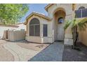 Charming front entrance featuring a landscaped walkway, large arched window, and inviting front door at 4353 W Walton Way, Chandler, AZ 85226