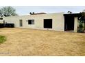 A spacious backyard with desert landscaping, offering privacy and potential for outdoor activities at 4727 E Euclid Ave, Phoenix, AZ 85044