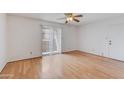 Inviting living room featuring natural light, wood floors, and a patio door at 5035 N 17Th Ave # 205, Phoenix, AZ 85015