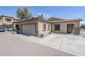 Charming single-Gathering home features a 2-car garage and well-maintained landscaping for great curb appeal at 6317 S Kimberlee Way, Chandler, AZ 85249