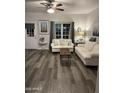 Bright living room with modern flooring, neutral decor, and comfortable furniture, ideal for relaxation and entertainment at 1601 N Saba St # 255, Chandler, AZ 85225