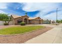 Street view of a well maintained single story home with drought-resistant landscaping at 2189 E Ranch Ct, Gilbert, AZ 85296