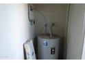Close-up of a water heater unit inside a utility closet at 2301 E University Dr # 334, Mesa, AZ 85213
