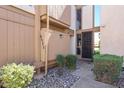 Inviting entryway with decorative stone landscaping and an attractive front door at 6533 at 6533 N 10Th Pl, Phoenix, AZ 85014