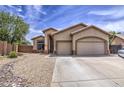 Attractive single-story home boasting a convenient two-car garage, neutral stucco, and desert landscaping at 863 S Del Rancho --, Mesa, AZ 85208