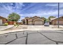 Inviting single-story home with a two-car garage and desert landscaping for a modern aesthetic and low maintenance at 863 S Del Rancho --, Mesa, AZ 85208